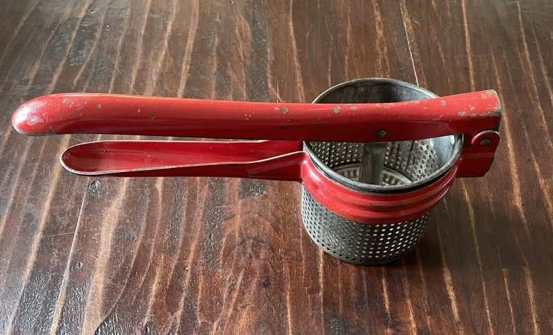 Vintage Mid Century Heavy Duty Red Metal Potato Ricer / Masher Press; 11”x3.5”